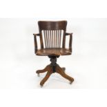 An oak swivel office/desk chair,