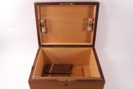 A mahogany humidor with vacant brass plague, and box wood and ebony stringing to the top,