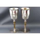 Two boxed parcel gilt Britannia Standard King Edgar goblets, numbered 89 and 90,