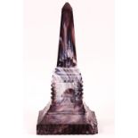 A 19th century purple and opaque white Slag glass obelisk,