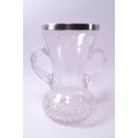 A silver rimmed celery vase of thistle form,