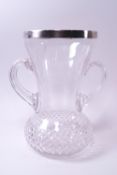 A silver rimmed celery vase of thistle form,