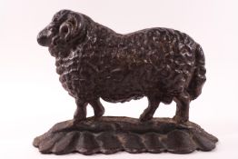 A cast iron door stop in the form of a ram,