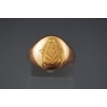 A yellow metal oval signet ring with Masonic engraving. Size: N Hallmarked 15ct gold,