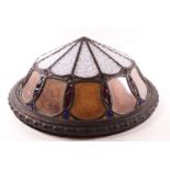 An early 20th century Art nouveau style ceiling light with stained glass and lead panels,