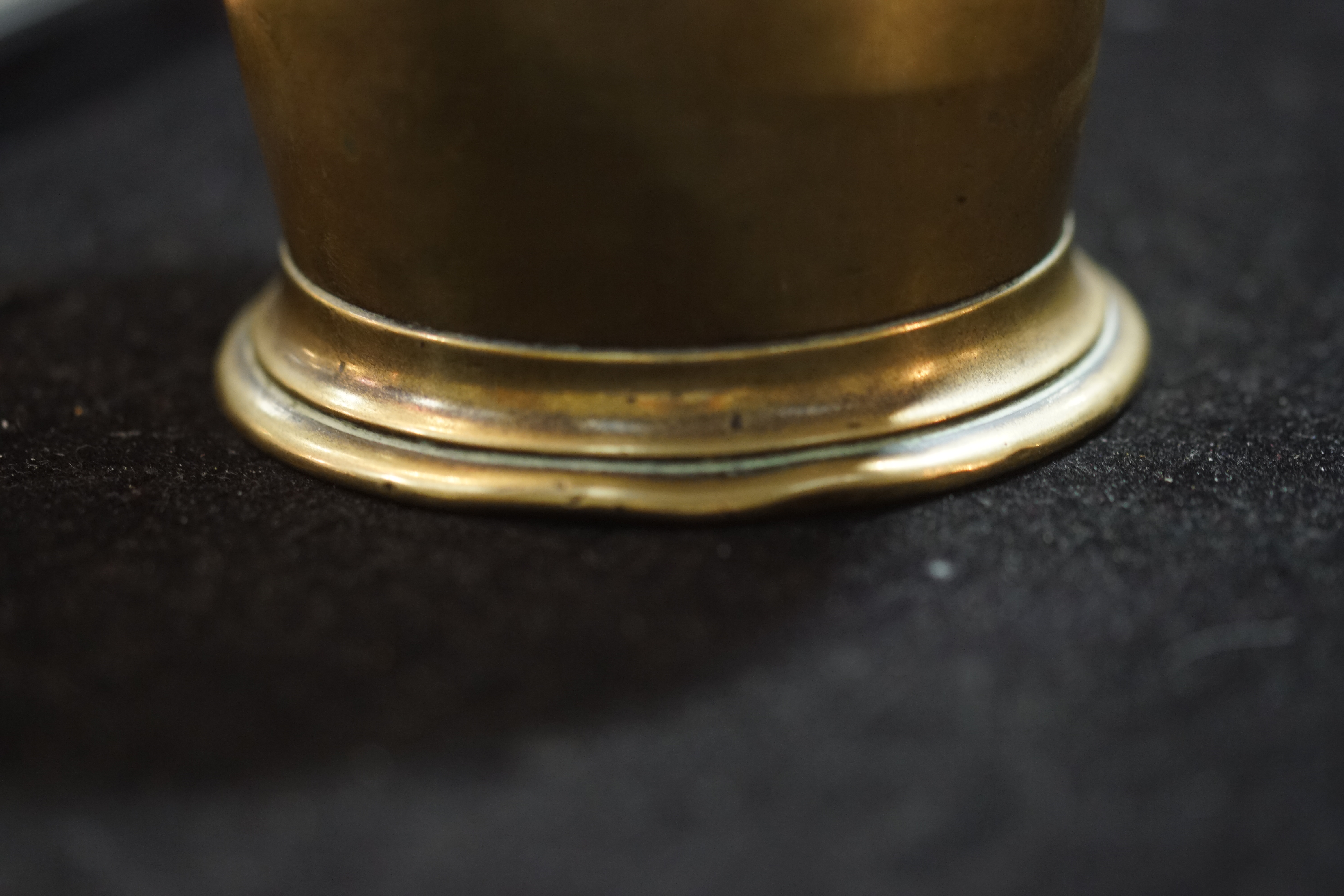 A brass mortar of traditional bell form with turned band decoration, - Image 3 of 5