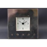 A square silver fronted framed desk clock, with quartz movement, Sheffield Jubilee marks,