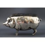 A pin cushion, in the form of a pig, London 1901,