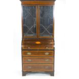 A satinwood inlaid mahogany bureau bookcase,