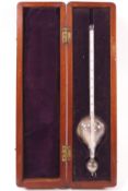 A mahogany cased hydrometer by J Chartelli, 43 Market Street, Manchester,