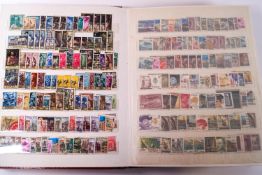 A box of six stamp albums containing a world collection