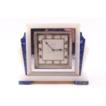 A Mappin & Webb onyx and Lapis lazuli square clock in the Art Deco style without flaring wings,