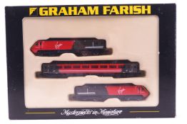 A Graham Farish Virgin train, consisting of two locomotives and a carriage,