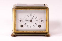 A brass cased carriage clock of unusual horizontal rectangular form,