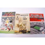 A box of football programmes,