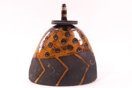A Studio pottery bottle and stopper, by Margaret Smuckmier, of arched form, signed and dated 95,