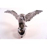 A Desom (?) chromed cast metal car mascot in the form of an eagle with outstretched wings,