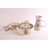 A Poole pottery combination posy bowl and trumpet vase, decorated with floral sprays, BF pattern,