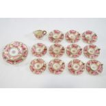 A porcelain tea service painted with roses with gilt leaves, retailed by T Goode & Co,