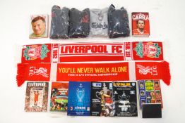 A box of Liverpool memorabilia, sweatshirt's, scarves,