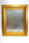 A large 21st century gilt framed mirror with deep moulded frame,