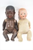 Two Armand Marseille bisque dolls heads with sleeping eyes and open mouths with two teeth,