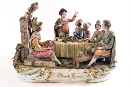 A large Capodimonte figure group 'Ottobrata Romana', topers seated around a table,