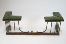 A brass club fender with leather upholstered and brass studded comers, 38cm wide,
