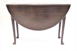 An 18th century style mahogany oval drop leaf gate leg table,