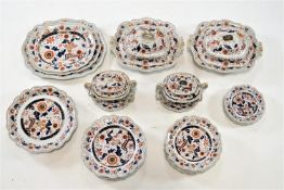 A Masons ironstone dinner service, decorated in Imari palette, comprising two tureens and covers,