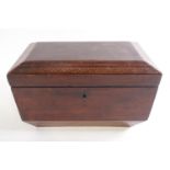 A George IV tea caddy in mahogany, of sarcophagus form,