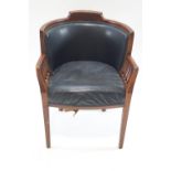 An Edwardian mahogany tub shaped chair with leatherette back and seat on square tapering legs,
