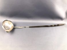 An 18th century white metal punch ladle with bead punched decorated edge/pouring lip,