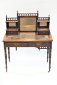 A Victorian mahogany dressing table, with raised mirrored back,