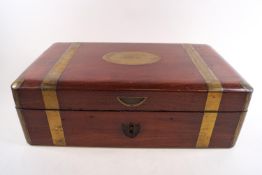 A brass bound mahogany campaign writing box of unusual form,