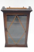 A 19th century mahogany glazed hanging display cabinet,