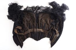 A pair of 19th Century stays/bodice in black silk and lace,