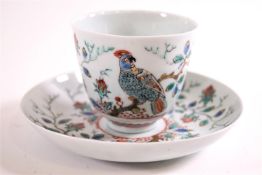 An 18th century Chinese porcelain tea bowl and saucer,