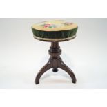 A Victorian piano stool,