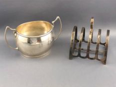 A small silver two handled bellied oval sugar bowl, Carrington & Co, London 1919, 7cm, 120grams,