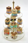 A set of twelve Franklin Mint, House of Faberge, Imperial music boxes and stand, in original boxes,