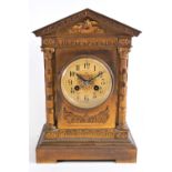 A French mid 19th century gilt metal mantel clock, of classical architectural form,