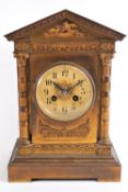 A French mid 19th century gilt metal mantel clock, of classical architectural form,