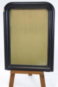 A busell finished nineteenth century mirror with arched top and bead work moulding, 103cm high,