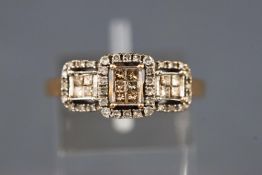 A yellow and white metal dress ring set with champagne princess cut diamonds