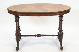 A Victorian walnut loo table,