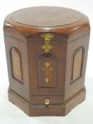 An Indian hardwood and brass inlaid octagonal box, with plinth base,