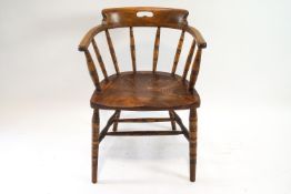A stick back Windsor chair with turned stretchers, 75cm high, 49cm wide,