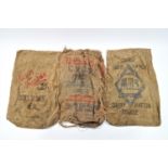 Six vintage hessian feed sacks,