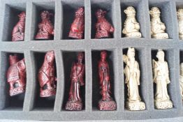 A boxed Berkeley BC3005 Mandarin Cardinal chess set